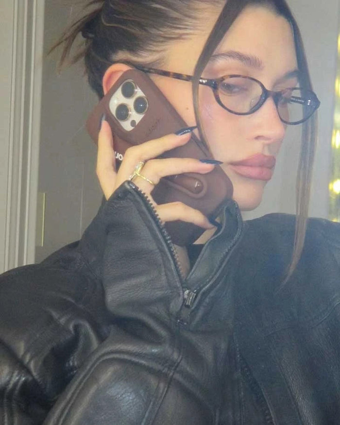 Hailey Bieber with the brown rhode lip case